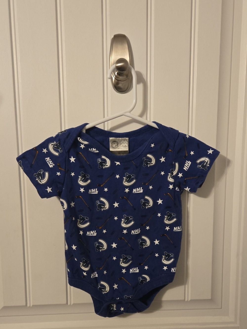 NHL Blue Vancouver Canucks All-Over Logo Short Sleeve Bodysuit